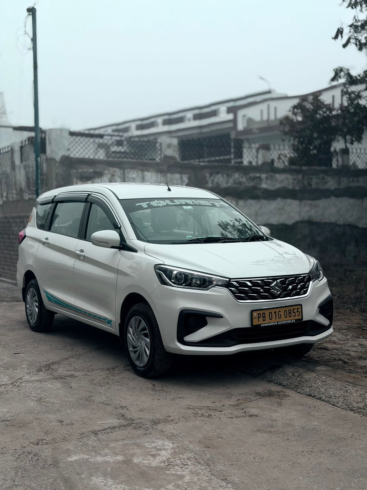Maruti Ertiga 7-seater taxi for airport service from Saila Khurd and Garhshankar